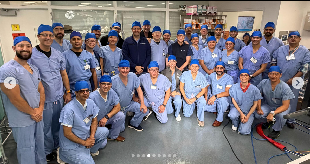 Group of surgeons in blue scrubs representing SORT 2027 at Cleveland Clinic